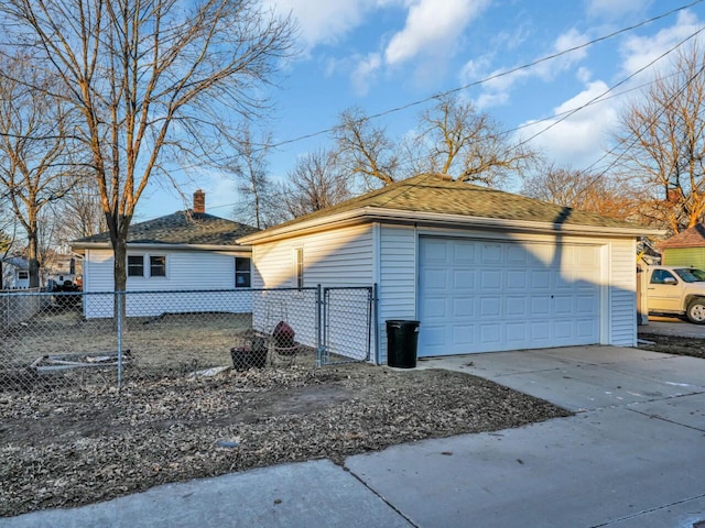 view of side of property featuring a garage