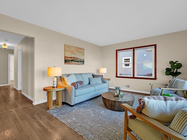 living room with hardwood / wood-style flooring