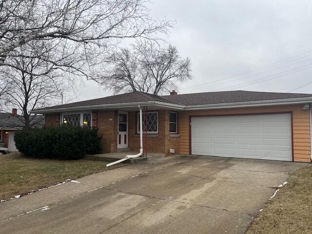 single story home with a garage