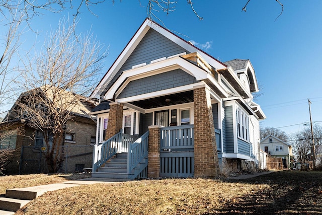 view of front of property featuring covered porch