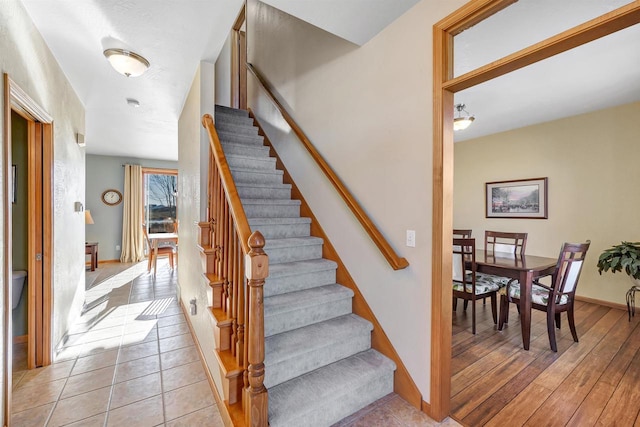 staircase featuring hardwood / wood-style floors