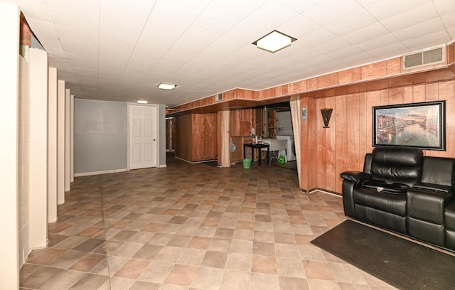 interior space featuring wood walls