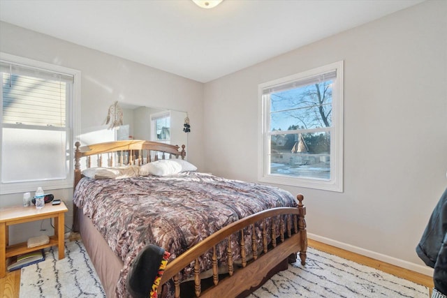 bedroom featuring light wood-type flooring