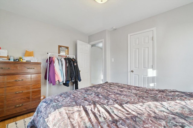 bedroom featuring hardwood / wood-style flooring