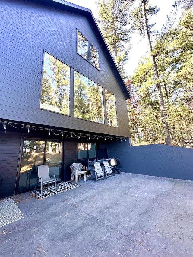 back of house featuring a patio area