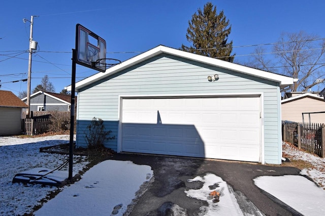 view of snow covered garage