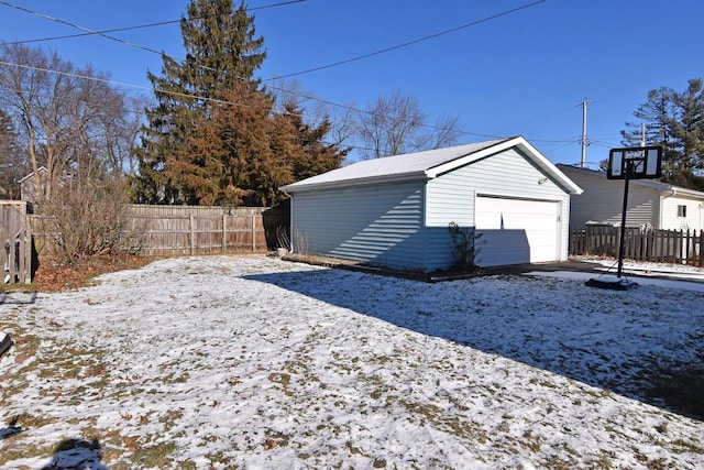 view of snow covered garage