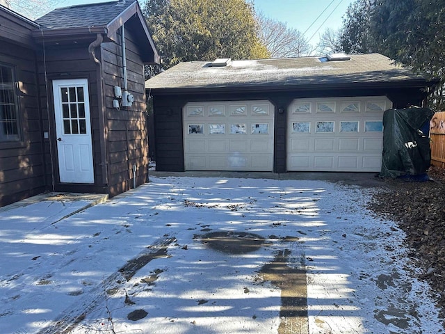 view of snow covered garage