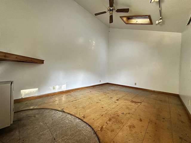 unfurnished room featuring ceiling fan and vaulted ceiling