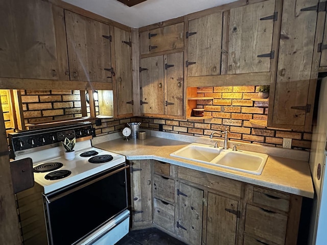 kitchen with white appliances, backsplash, and sink