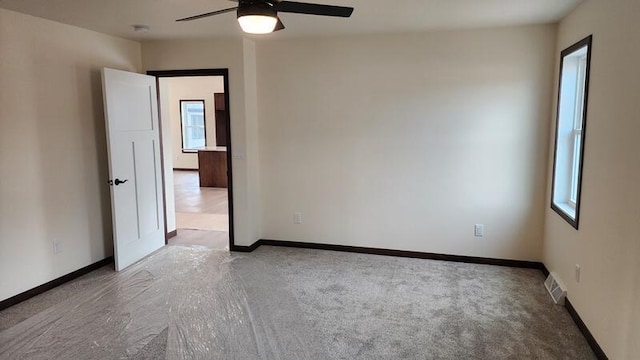 empty room with ceiling fan