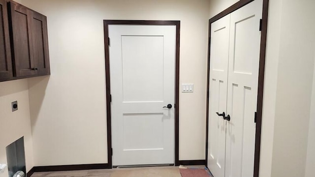 laundry area featuring cabinets and hookup for an electric dryer