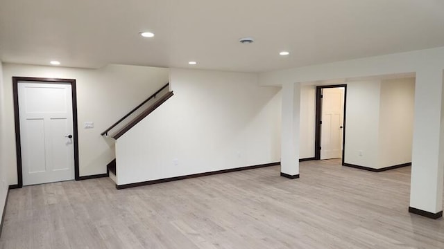 basement featuring light wood-type flooring