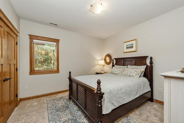 bedroom with light carpet