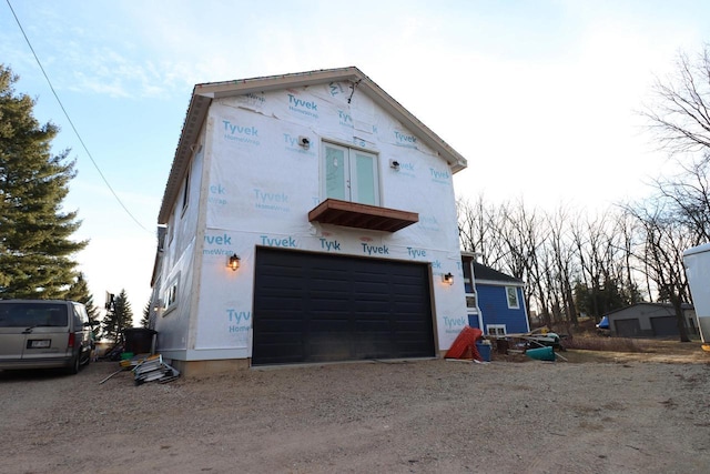 exterior space featuring a garage