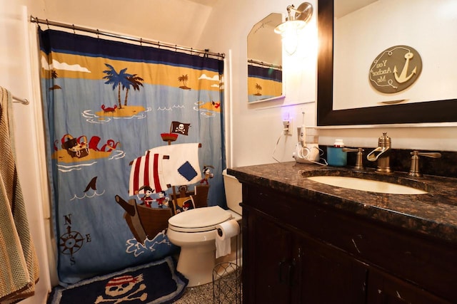 bathroom with toilet, curtained shower, and vanity