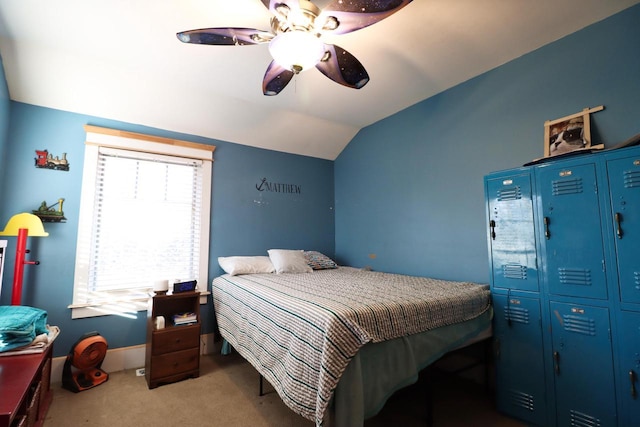 bedroom with lofted ceiling, carpet flooring, and ceiling fan