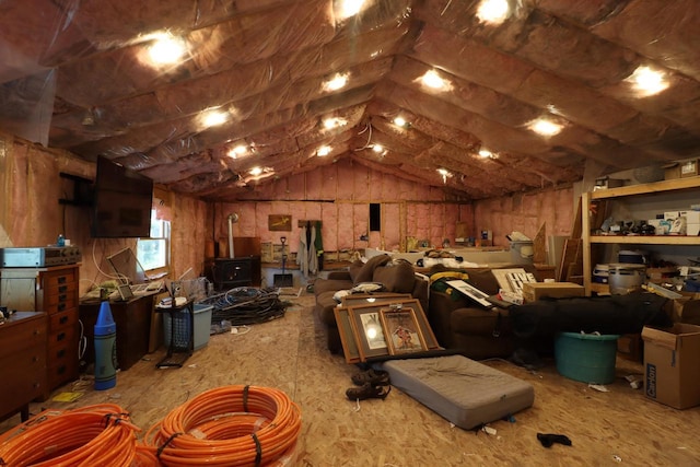 miscellaneous room featuring lofted ceiling