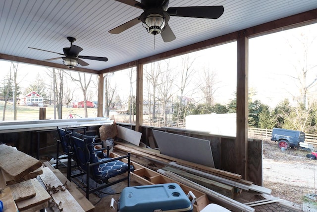 sunroom / solarium with ceiling fan