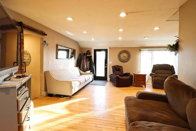 living room with light hardwood / wood-style floors