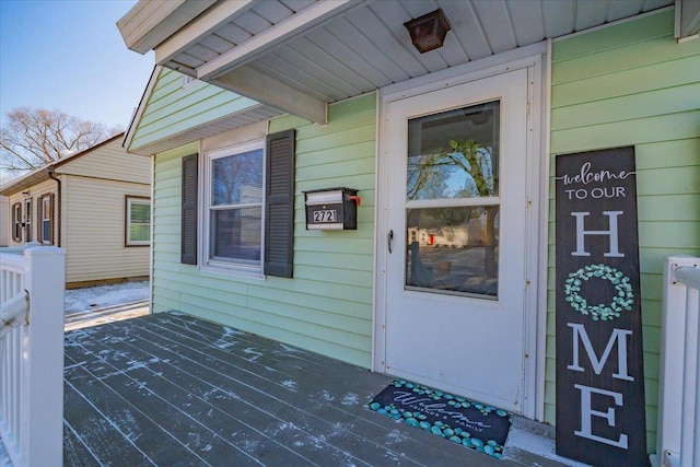 doorway to property with a deck