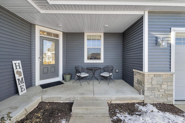 doorway to property with covered porch