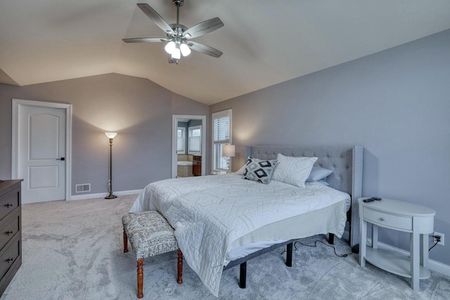 bedroom with vaulted ceiling, light carpet, and ceiling fan