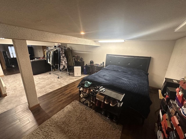 bedroom featuring hardwood / wood-style flooring