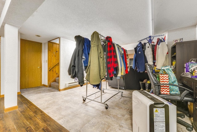 spacious closet with hardwood / wood-style floors