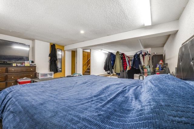 bedroom featuring a textured ceiling