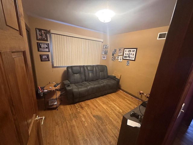 living room with hardwood / wood-style floors