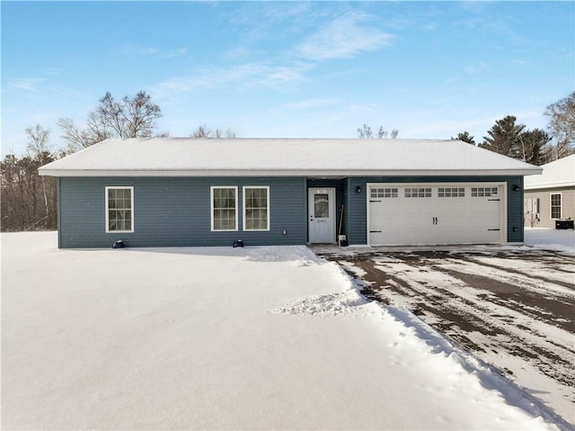 single story home featuring a garage