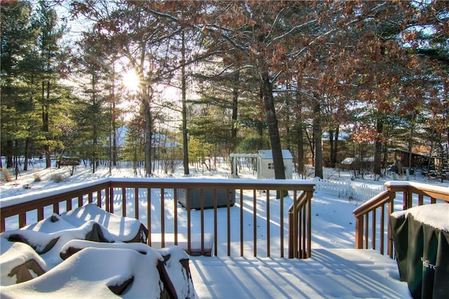 view of snow covered deck