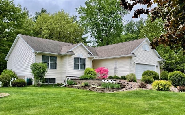 ranch-style house with a front lawn and a garage