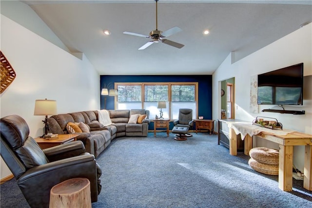 living room featuring carpet, ceiling fan, and vaulted ceiling