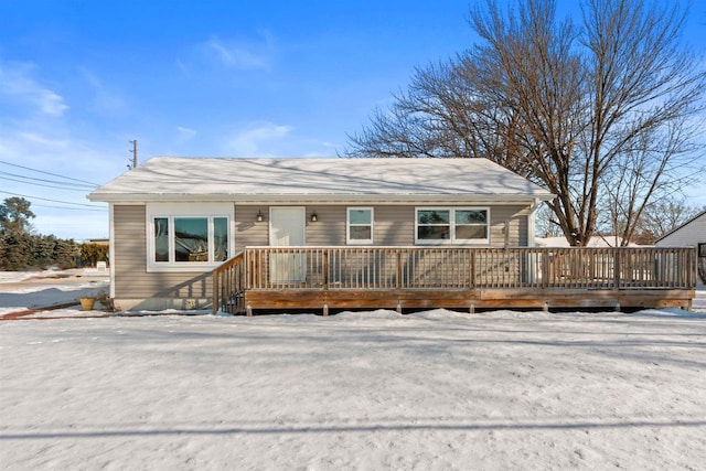 view of front of home featuring a wooden deck