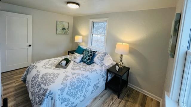 bedroom featuring wood-type flooring