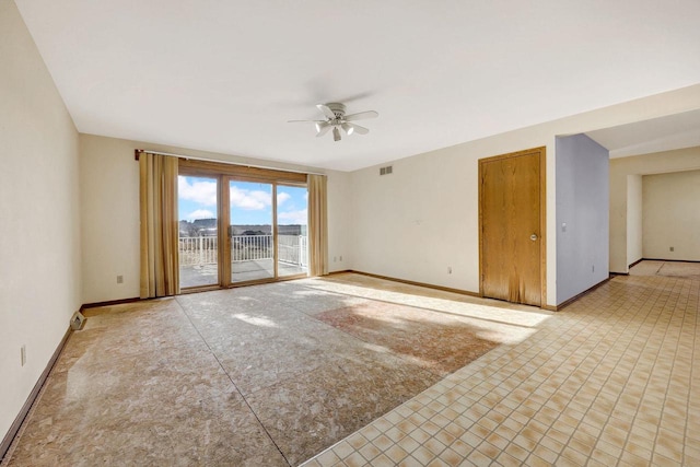 unfurnished room with ceiling fan