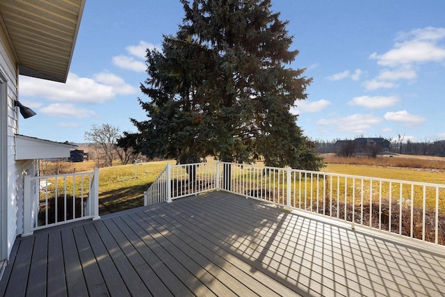 wooden terrace with a rural view