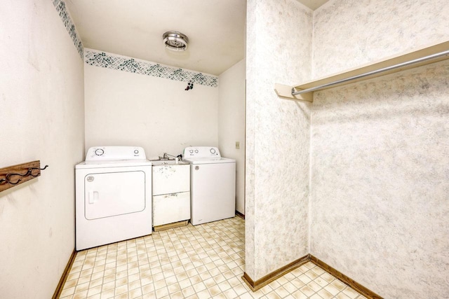 laundry room with independent washer and dryer