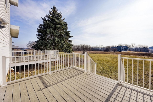 deck featuring a lawn