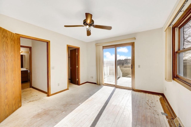 unfurnished bedroom with ceiling fan, light hardwood / wood-style flooring, access to outside, and connected bathroom