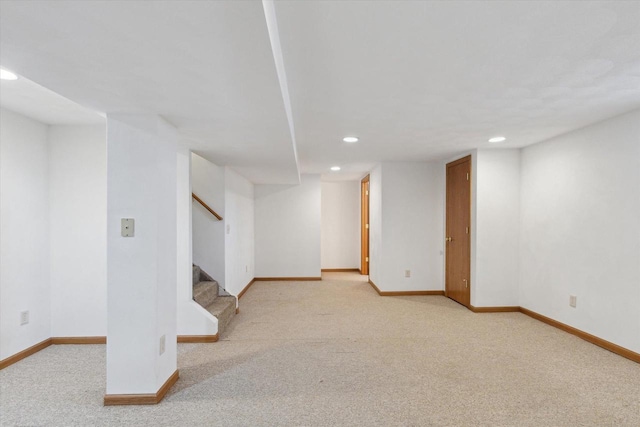 basement with light carpet