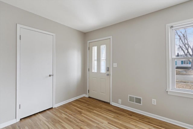 entrance foyer featuring light hardwood / wood-style floors