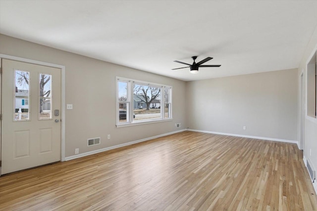 foyer entrance featuring ceiling fan and light wood-type flooring