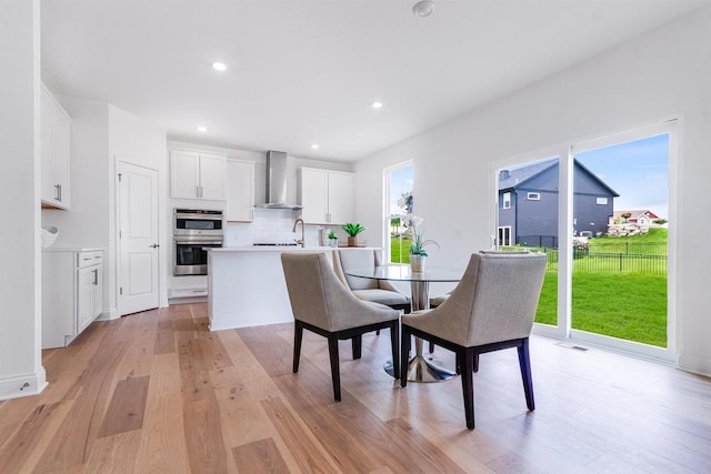 dining area featuring light hardwood / wood-style floors