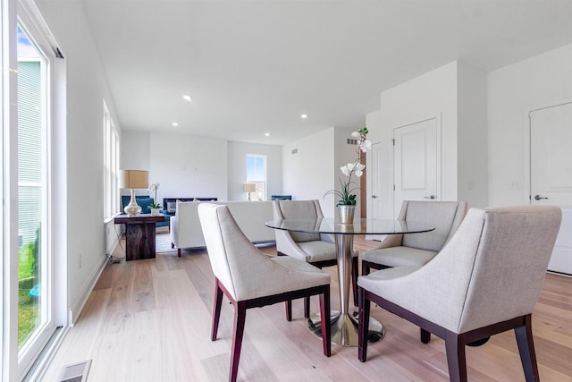 dining room with light wood-type flooring