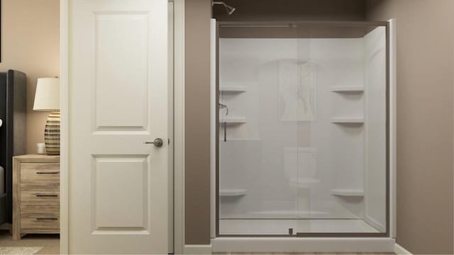 bathroom featuring an enclosed shower