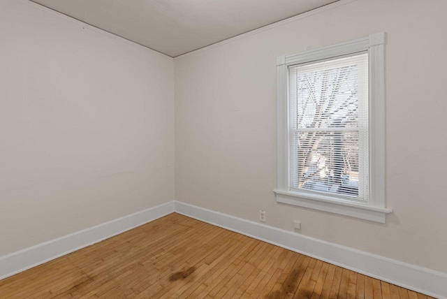 unfurnished room with wood-type flooring