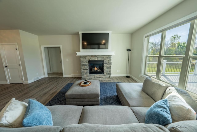 living room featuring hardwood / wood-style floors and a fireplace